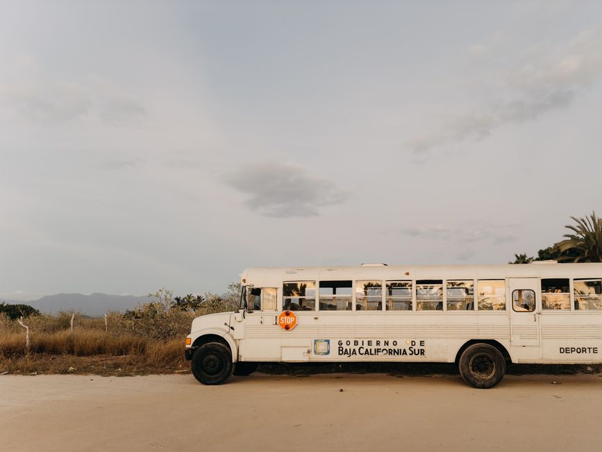 A charter bus parked and ready for passengers before a group trip