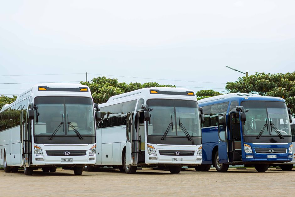 A mini coach charter bus parked and ready to board 25 passengers for a group trip