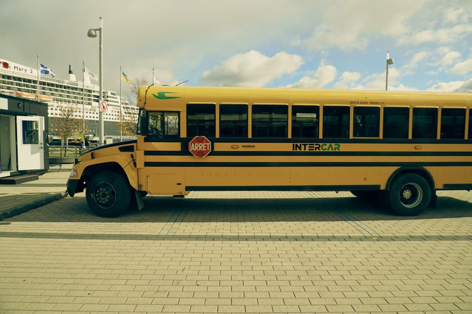 Charter bus parked at a cruise port terminal for group passenger transfer
