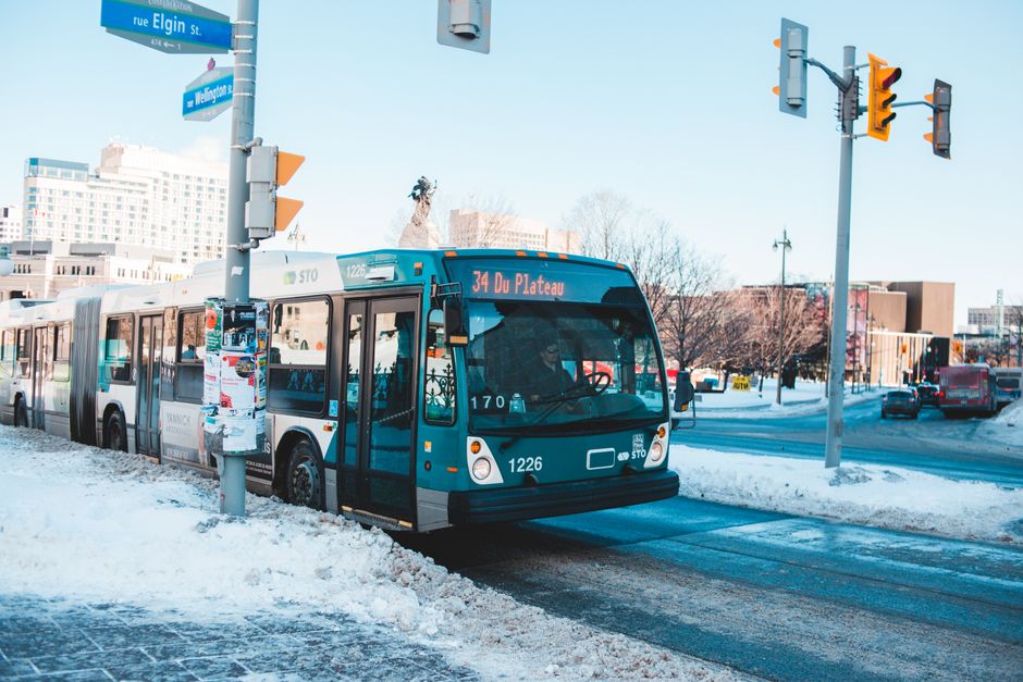 Charter bus parked at one of several stops during a multi-stop group trip itinerary