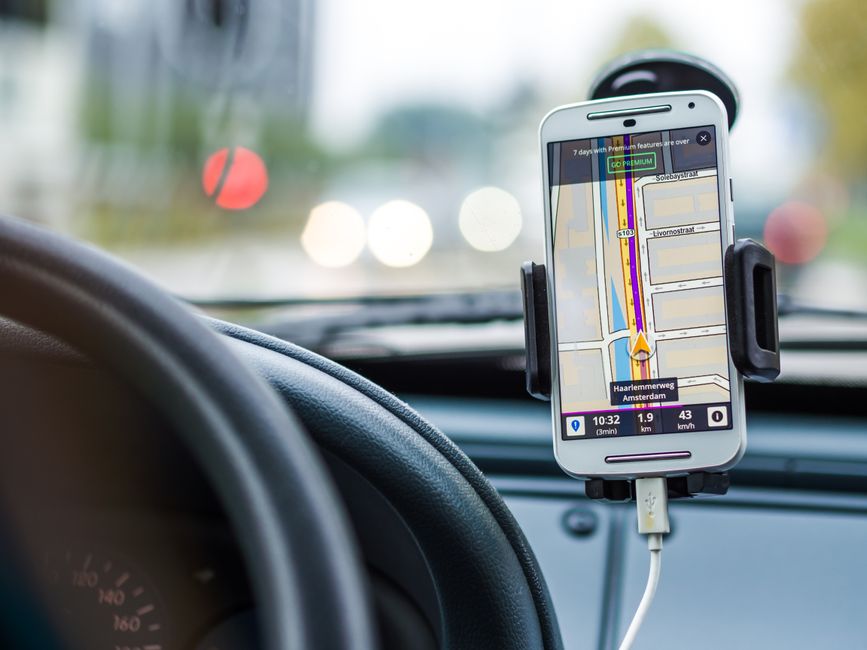 Dispatcher viewing charter bus GPS tracking location on a fleet management screen