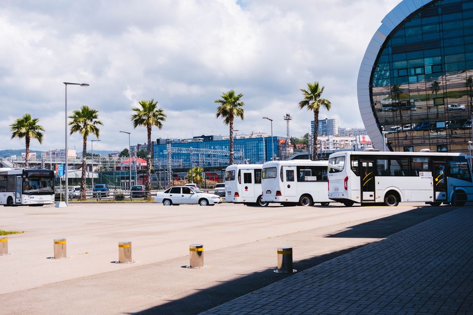 Full-size charter bus parked outside showing its height and overall dimensions