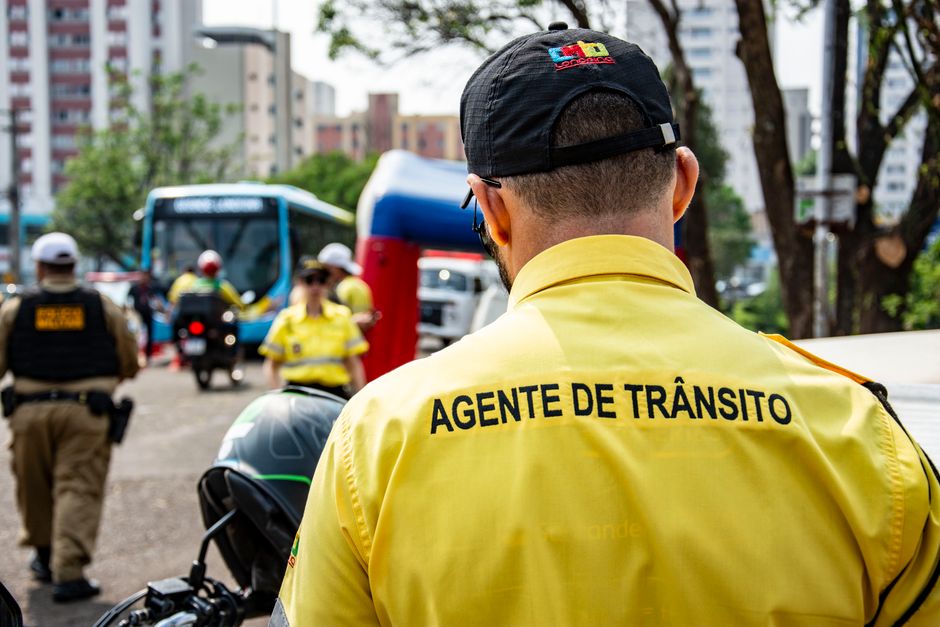 Government employees boarding a charter bus for official travel