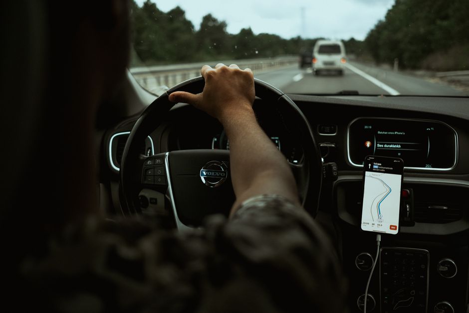 GPS navigation screen showing a charter bus route on a dashboard tracking system