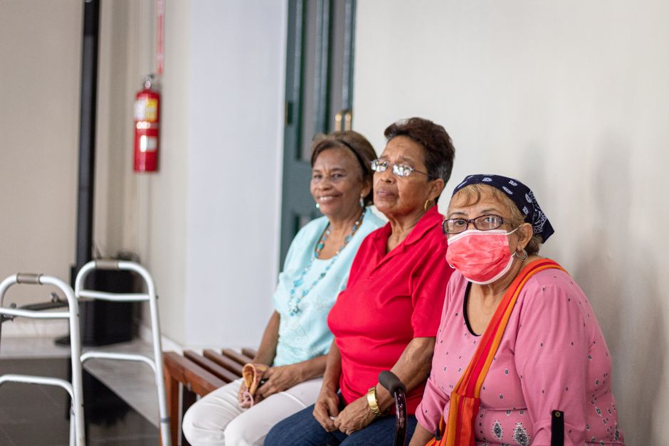 Group of senior citizens boarding a charter bus for a group trip