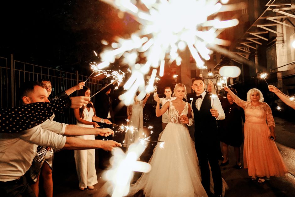 Wedding guests boarding a charter bus at a destination wedding venue
