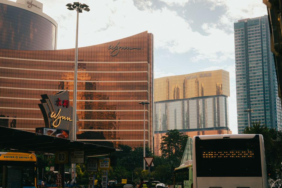 Charter bus parked outside a casino resort entrance for a group gaming trip