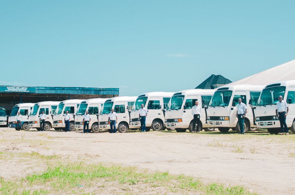 Row of modern charter buses representing the current charter bus industry outlook